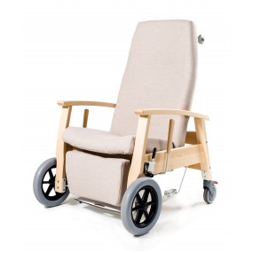 Comfortable reclining care chair on wheels GAVOTA F1 with operator positioning